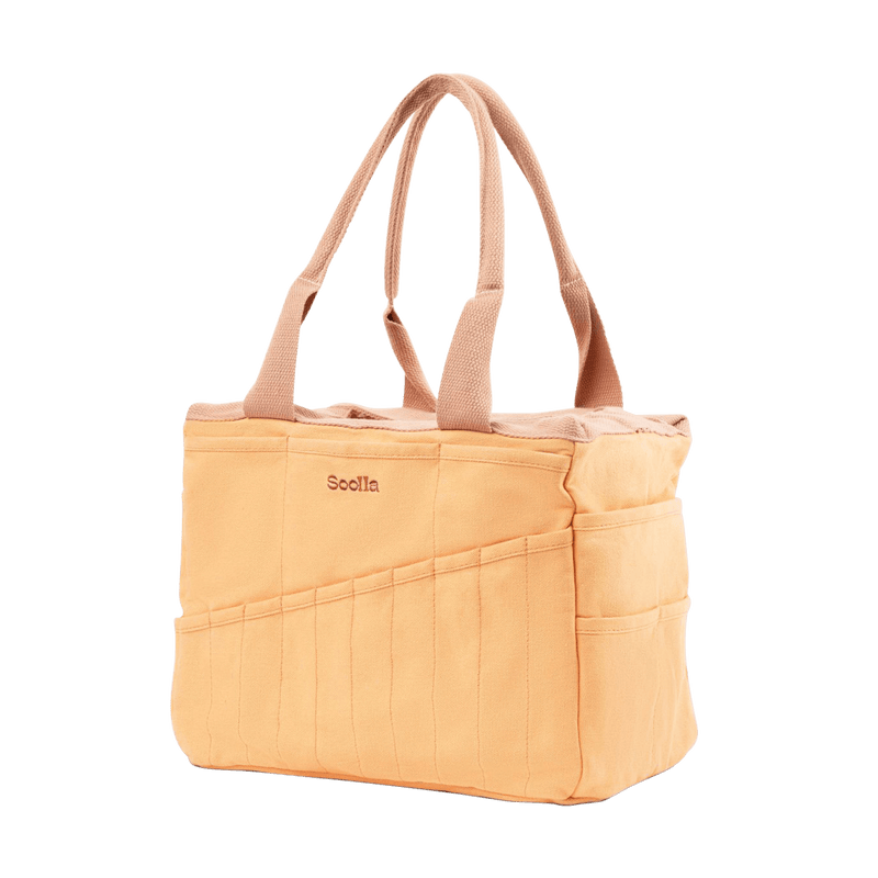 Right side view of Soolla Studio Bag in Creamsicle Crush, a pottery tool bag and artist bag