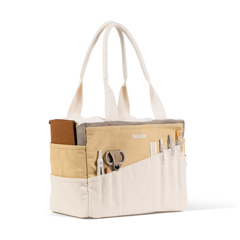 Right side view with supplies of Soolla Studio Bag in Driftwood, a pottery tool bag and artist bag