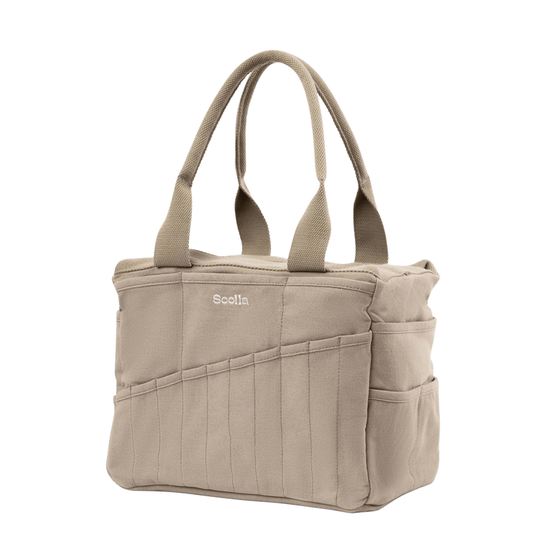 Left side view of Soolla Studio Bag in Graphite, a pottery tool bag and artist bag