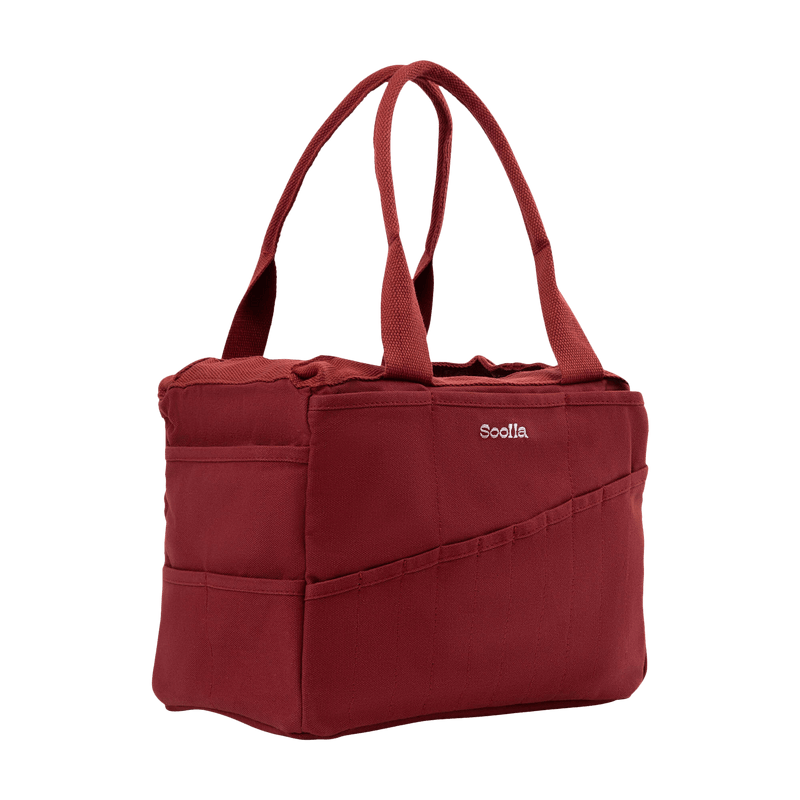Left side view of Soolla Studio Bag in Sangria, a pottery tool bag and artist bag