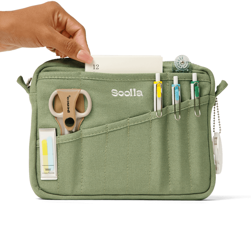 Lifestyle view of Soolla Studio Pouch, a pen pouch and soft pencil case for stationery and art supplies
