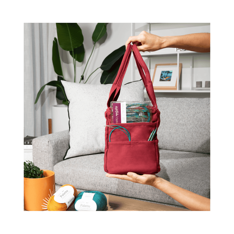 Lifestyle view of Soolla Studio Bag in Blue Skies, an artist bag for pottery, knitting, and crochet supplies
